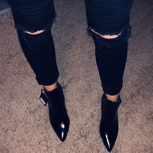 Black pointed toe boots